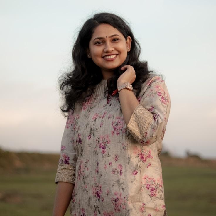 Kai Nakamura, Client Relations Director, discussing corporate gifting strategy with business clients